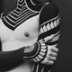 Imagen para el artículo titulado Los tatuajes no están quietos: tus células inmunitarias se comen la tinta y la vomitan, una y otra vez